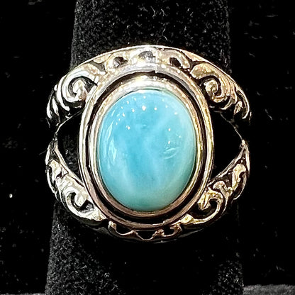 Sterling silver ring with black antiqued highlights set with blue larimar stone.