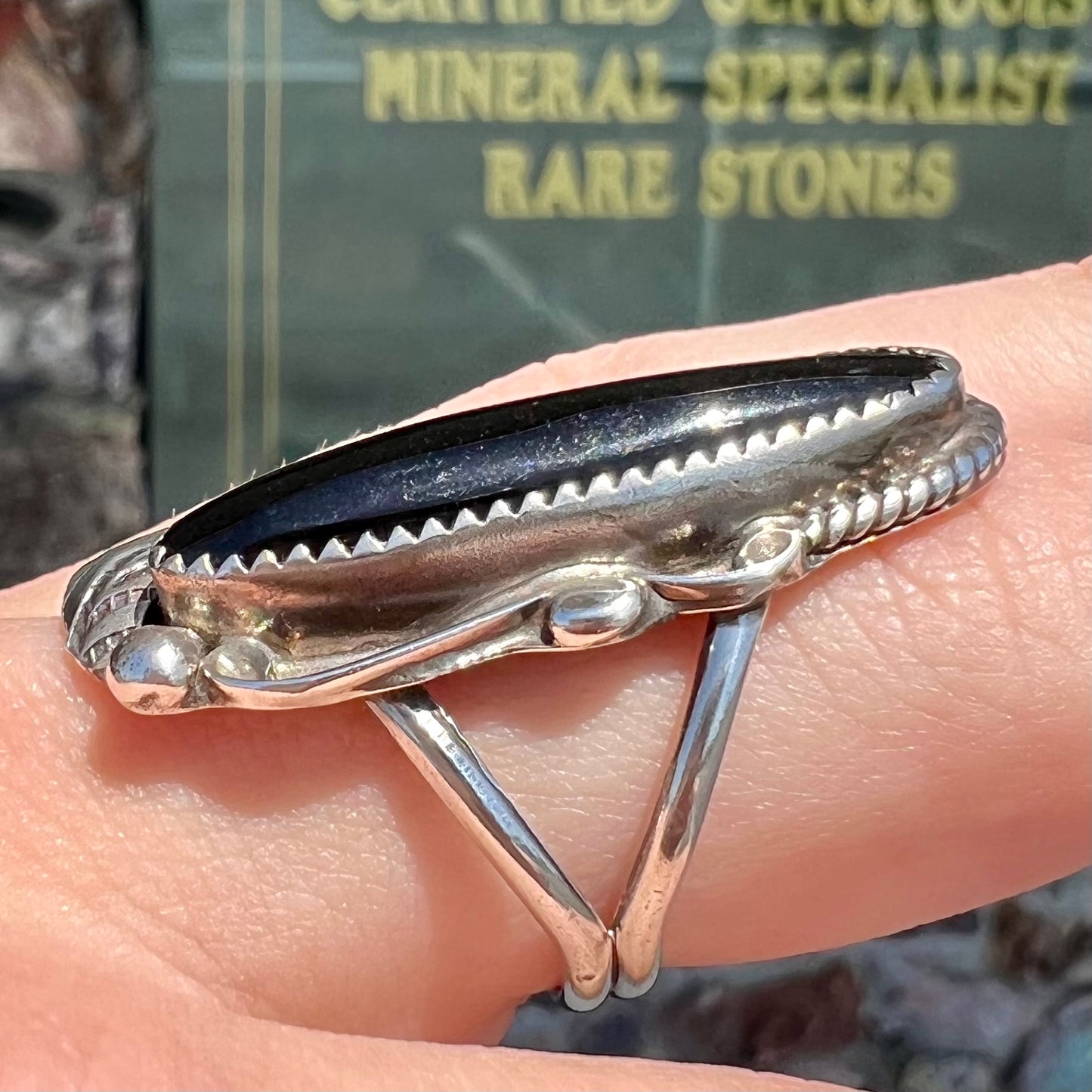 A sterling silver Navajo style onyx ring.