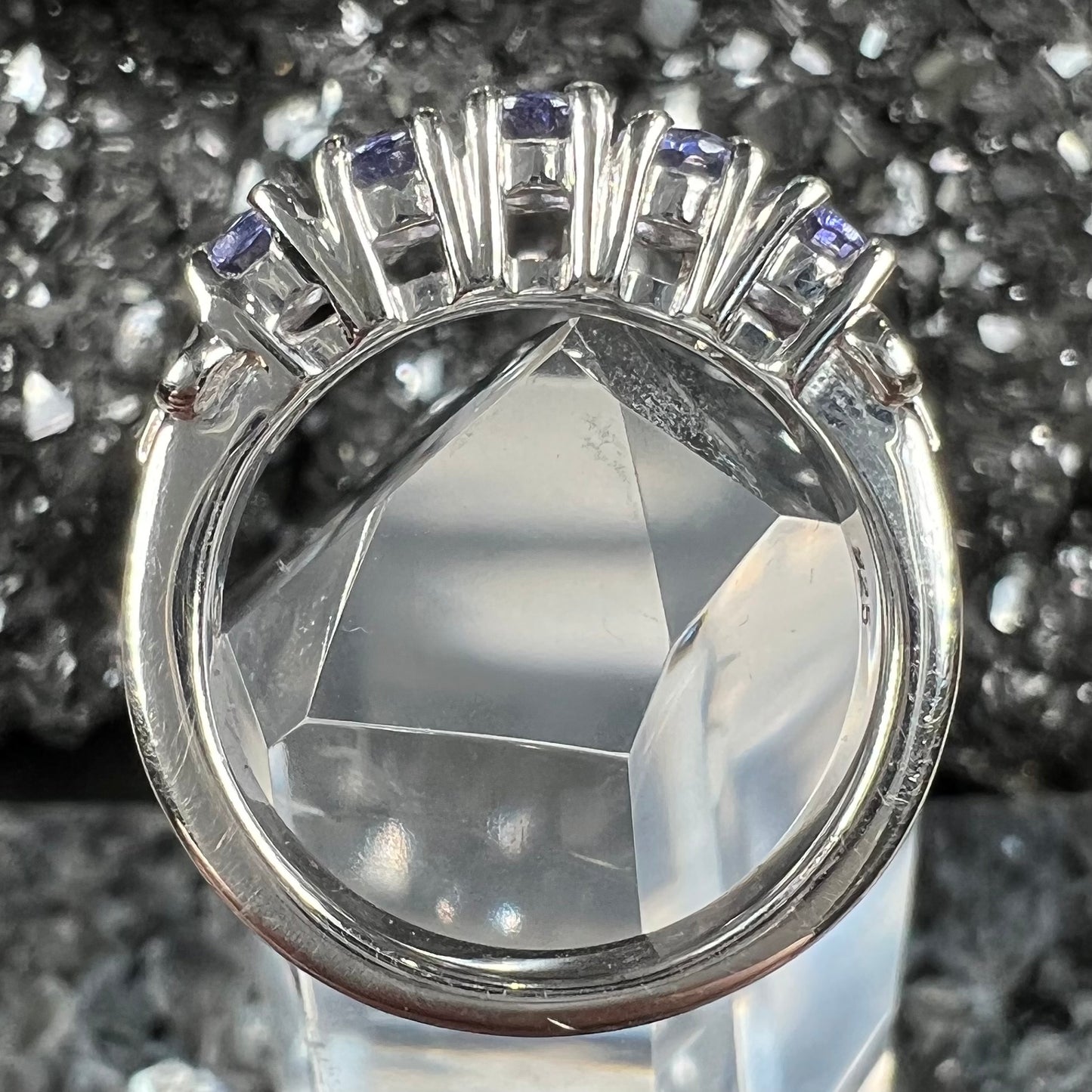 A sterling silver five stone oval cut tanzanite ring.