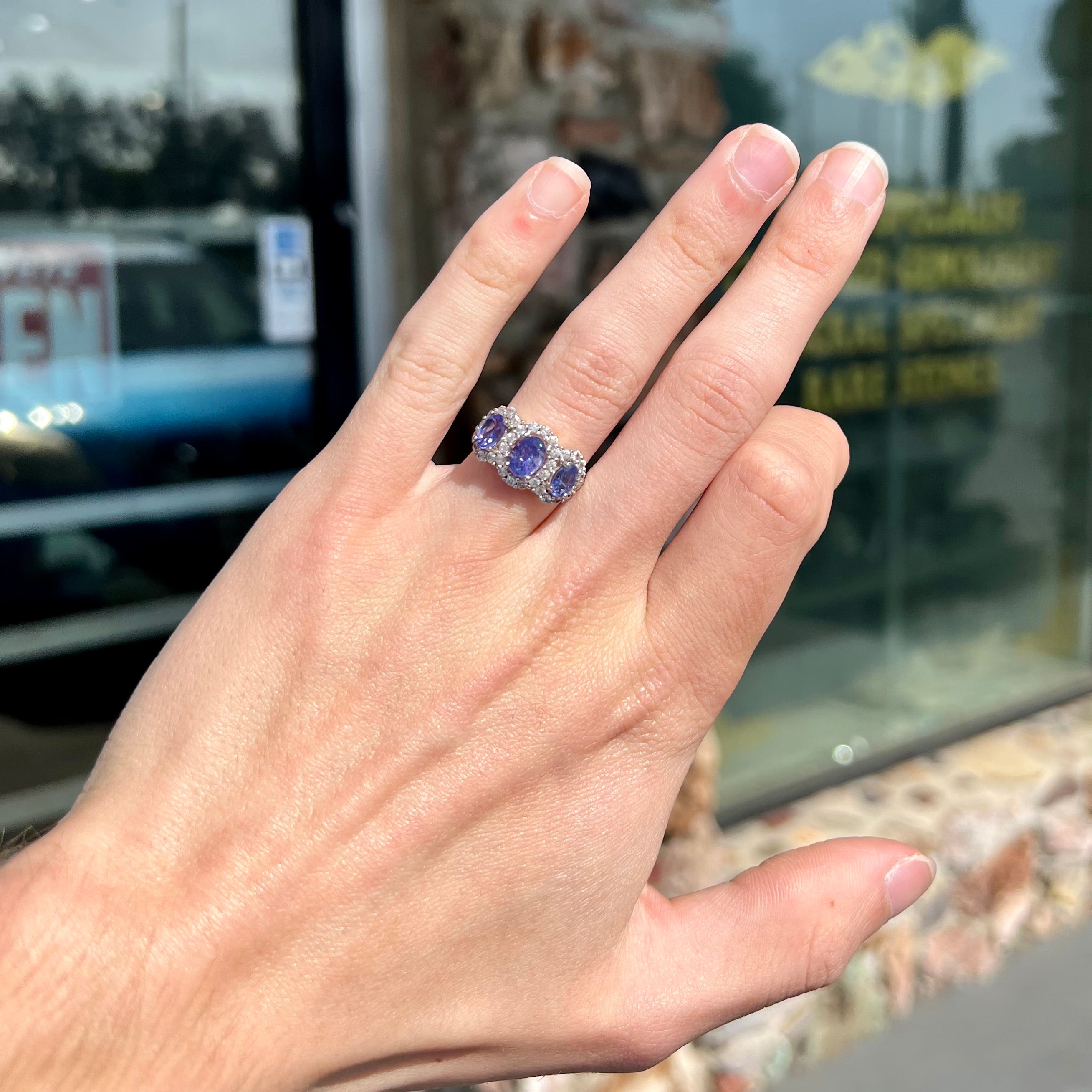 Oval Tanzanite Ring with 2D Halo – Happy Jewelers