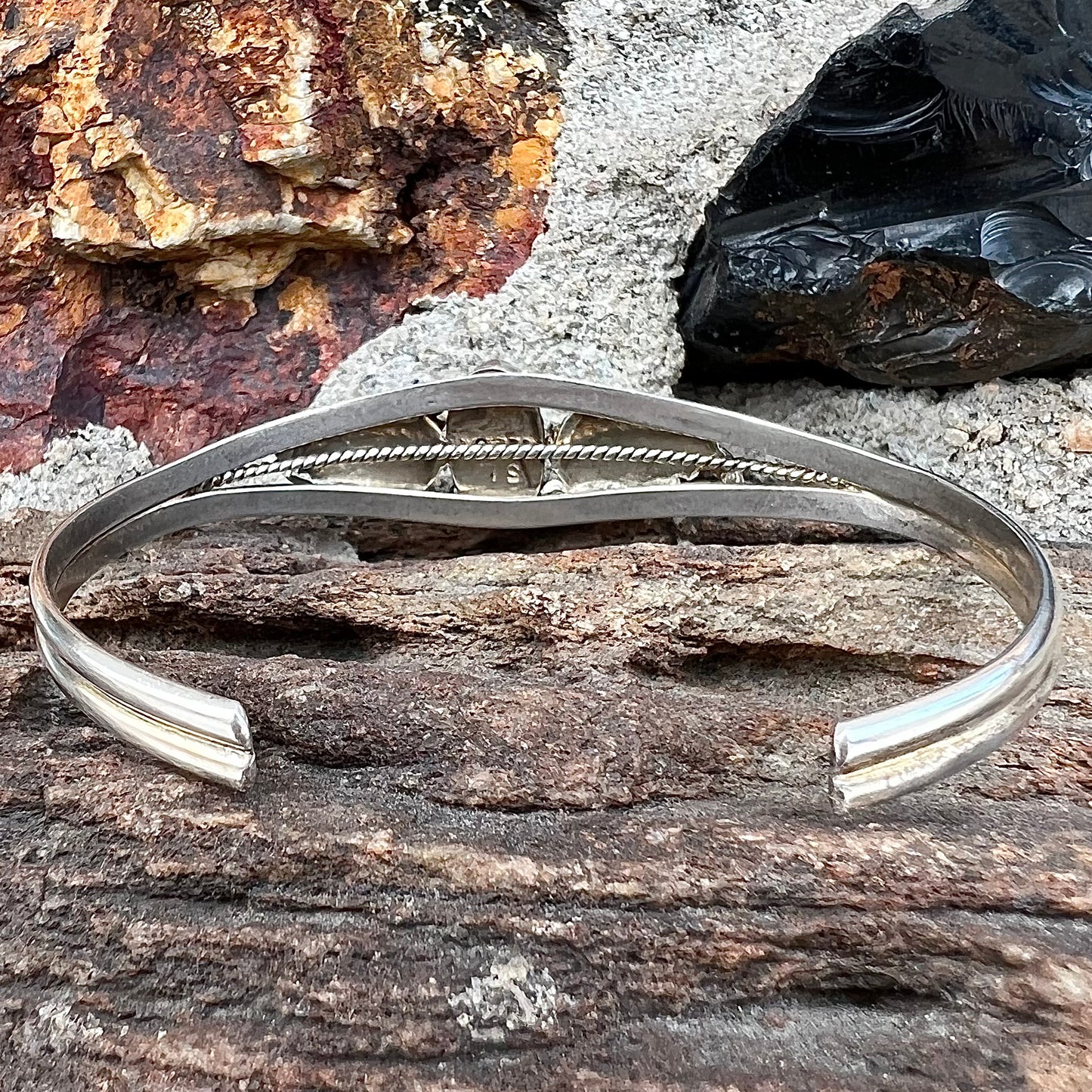 A ladies' sterling silver turquoise cuff bracelet.