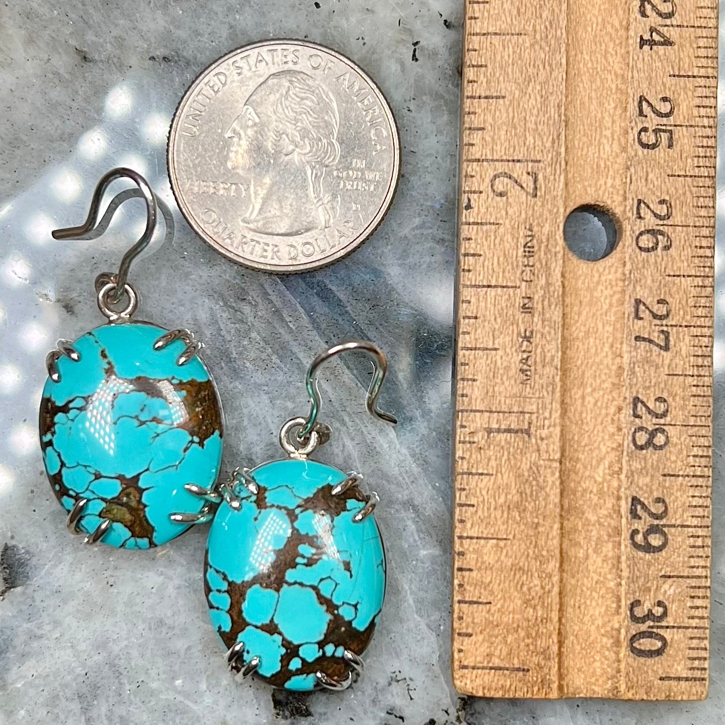 Sterling silver French wire earrings double prong set with cabochon cut turquoise from Valley Blue Mine in Lander County, Nevada.