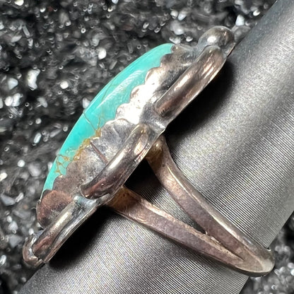 An estate sterling silver turquoise ring.  The ring was handmade by Navajo artist, Roy Buck.