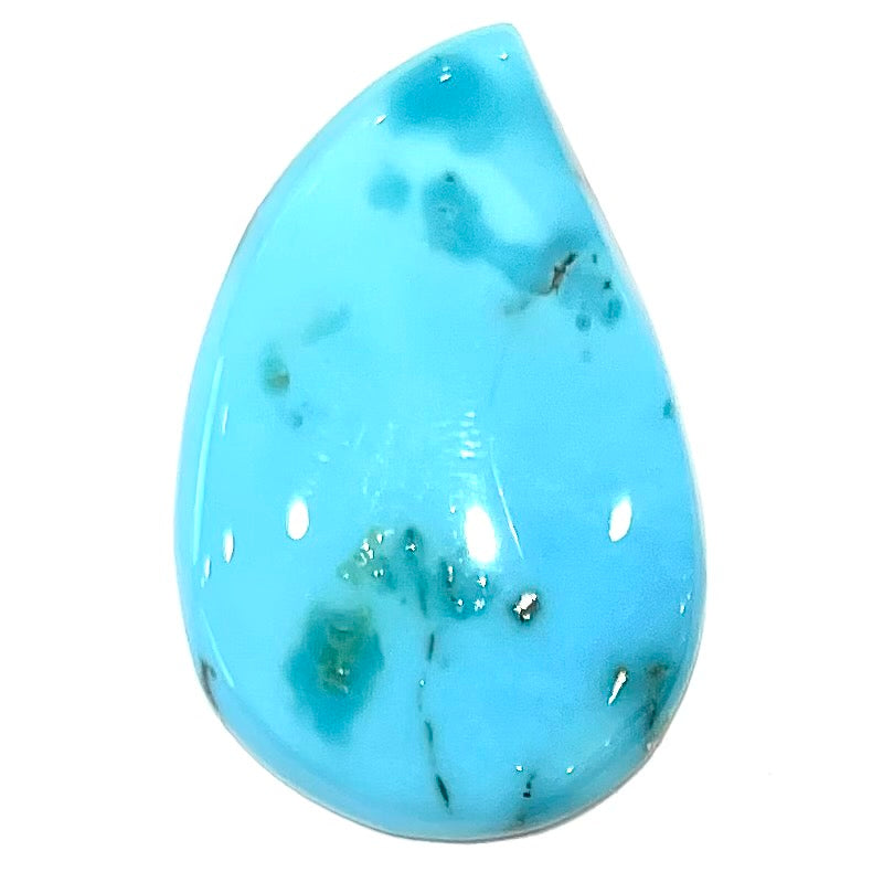 A loose, water drop shaped turquoise stone from the Sleeping Beauty Mine, Arizona.