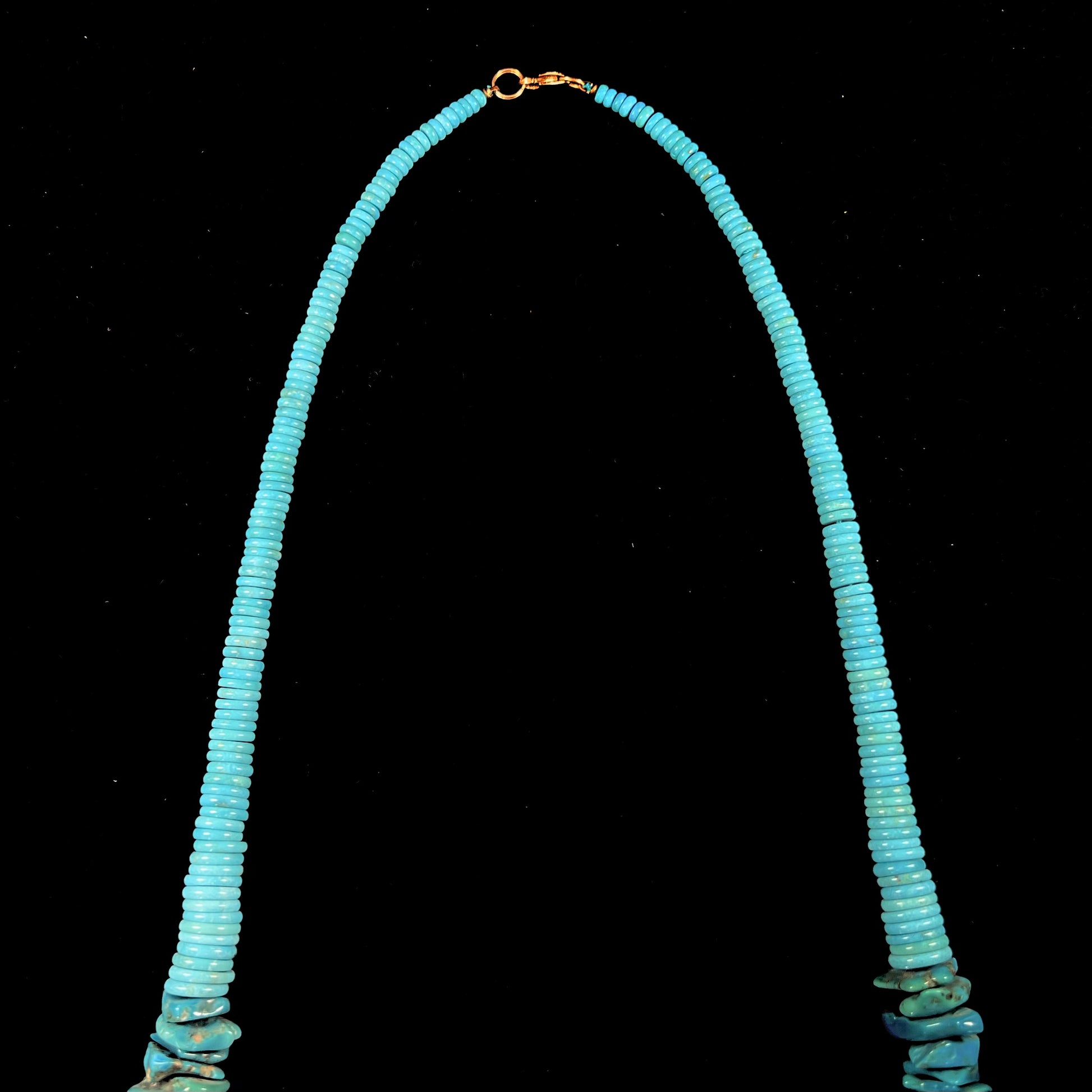 A men's turquoise stone bead necklace made from polished Kingman and Sleeping Beauty Mine turquoise.