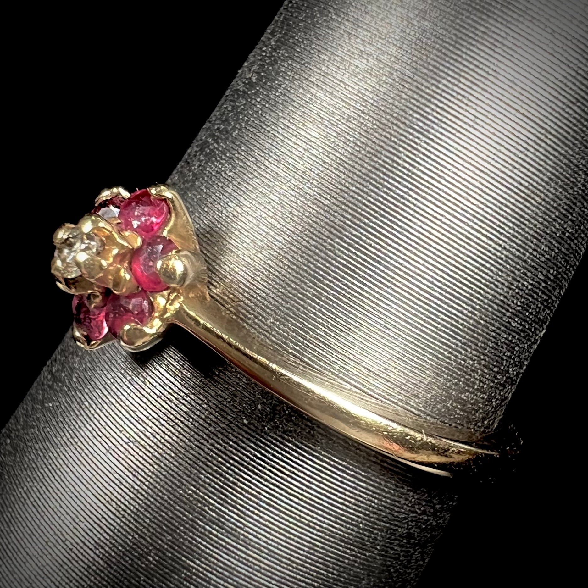 A ladies' estate yellow gold ruby and diamond cluster ring.