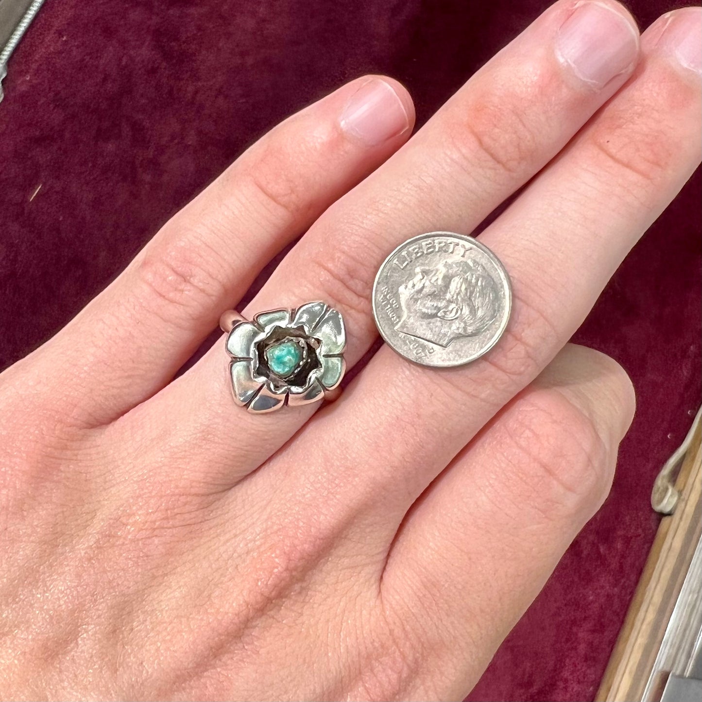 A handmade, sterling silver Native American turquoise nugget ring.