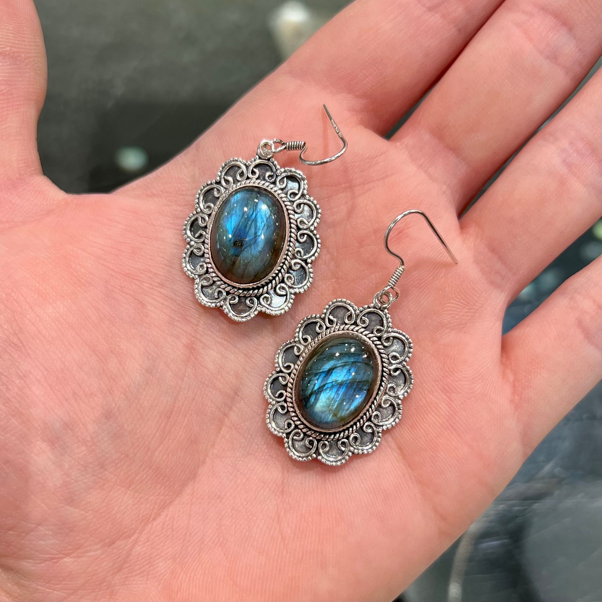 A pair of Southwest style sterling silver labradorite dangle earrings.