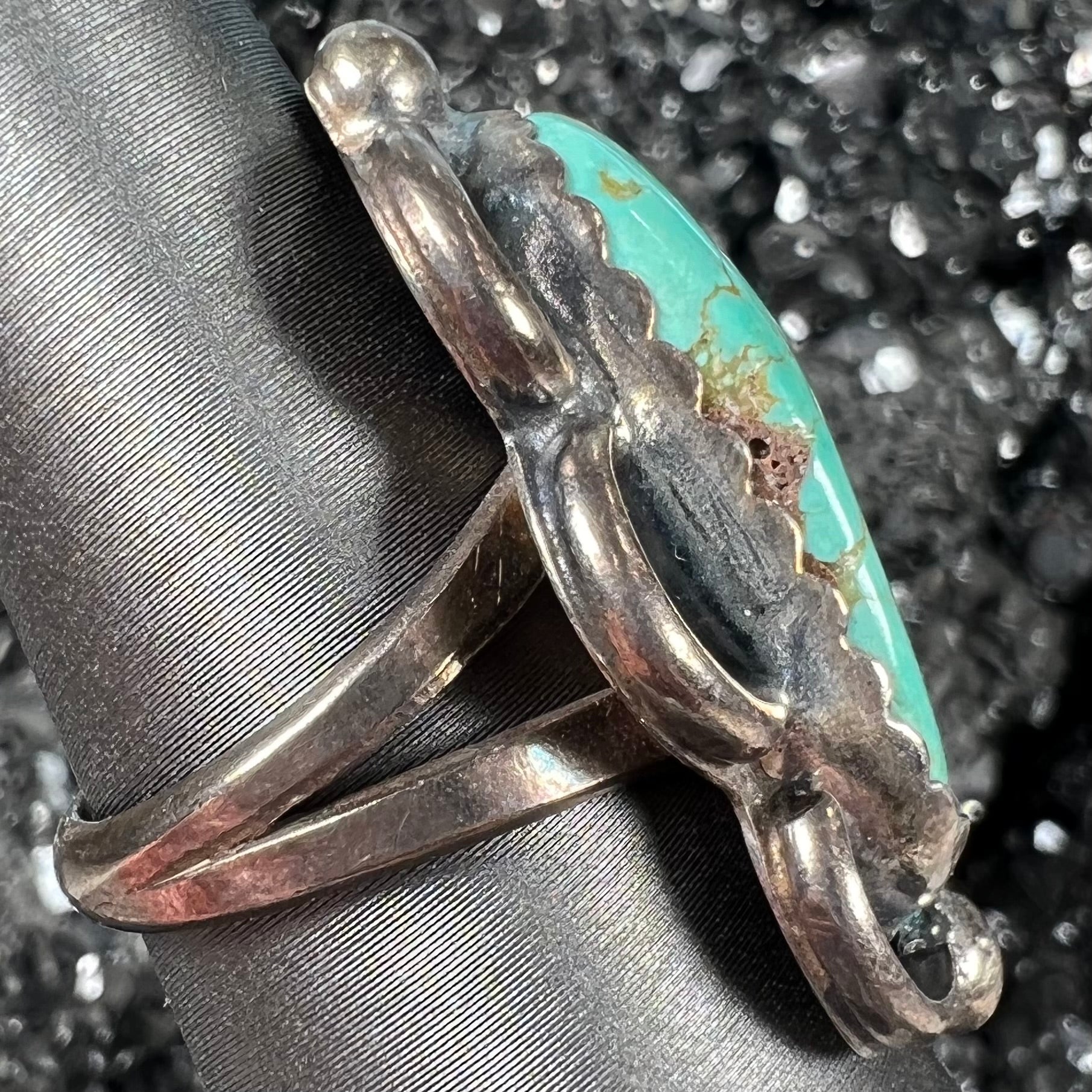 An estate sterling silver turquoise ring.  The ring was handmade by Navajo artist, Roy Buck.
