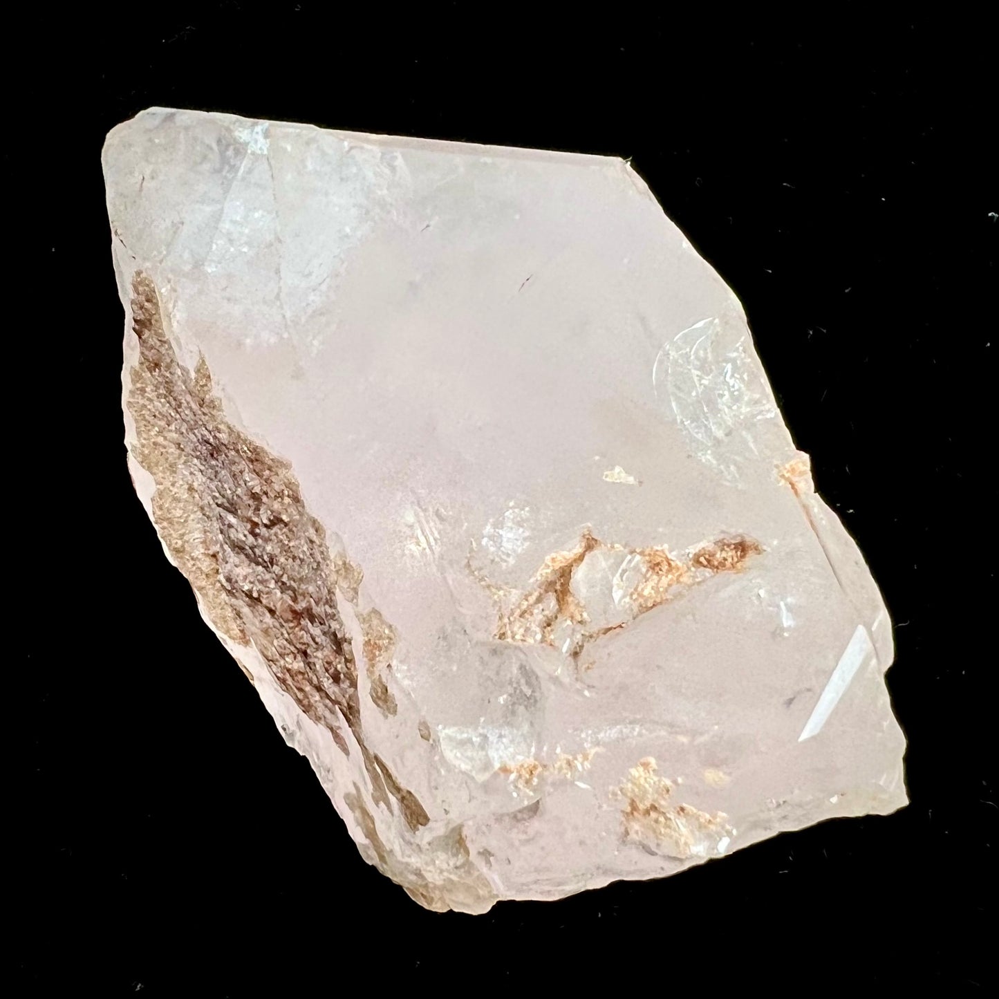 A rough, pink morganite crystal from the Stewart Mine in Pala, California.