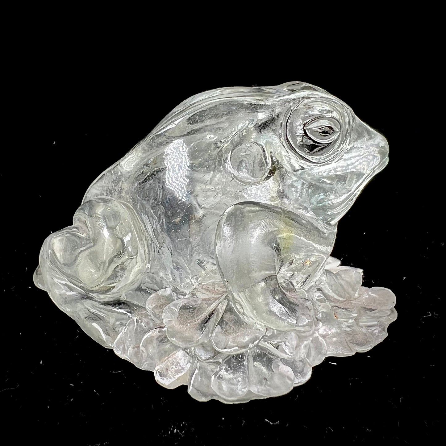 A crystal frog carved from topaz by artist Ronald Stevens.