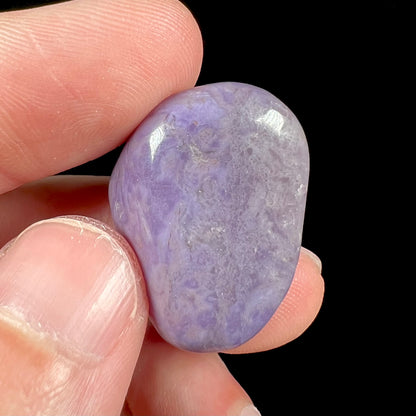 A rounded, tumbled piece of purple turkiyenite jade.  Bursa, Turkish material.