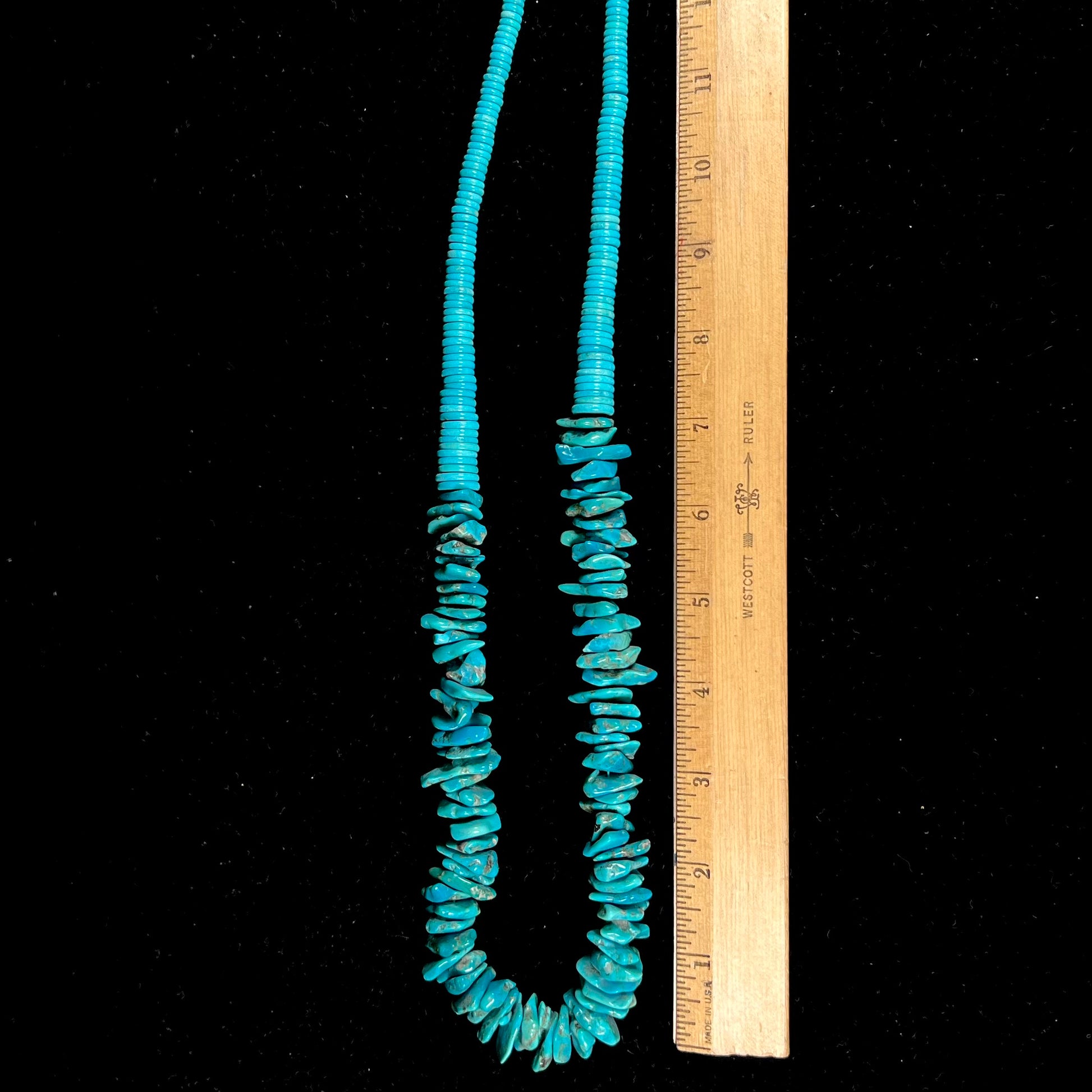 A men's turquoise stone bead necklace made from polished Kingman and Sleeping Beauty Mine turquoise.