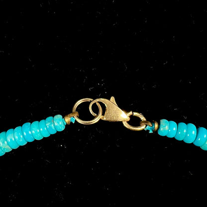 A men's turquoise stone bead necklace made from polished Kingman and Sleeping Beauty Mine turquoise.