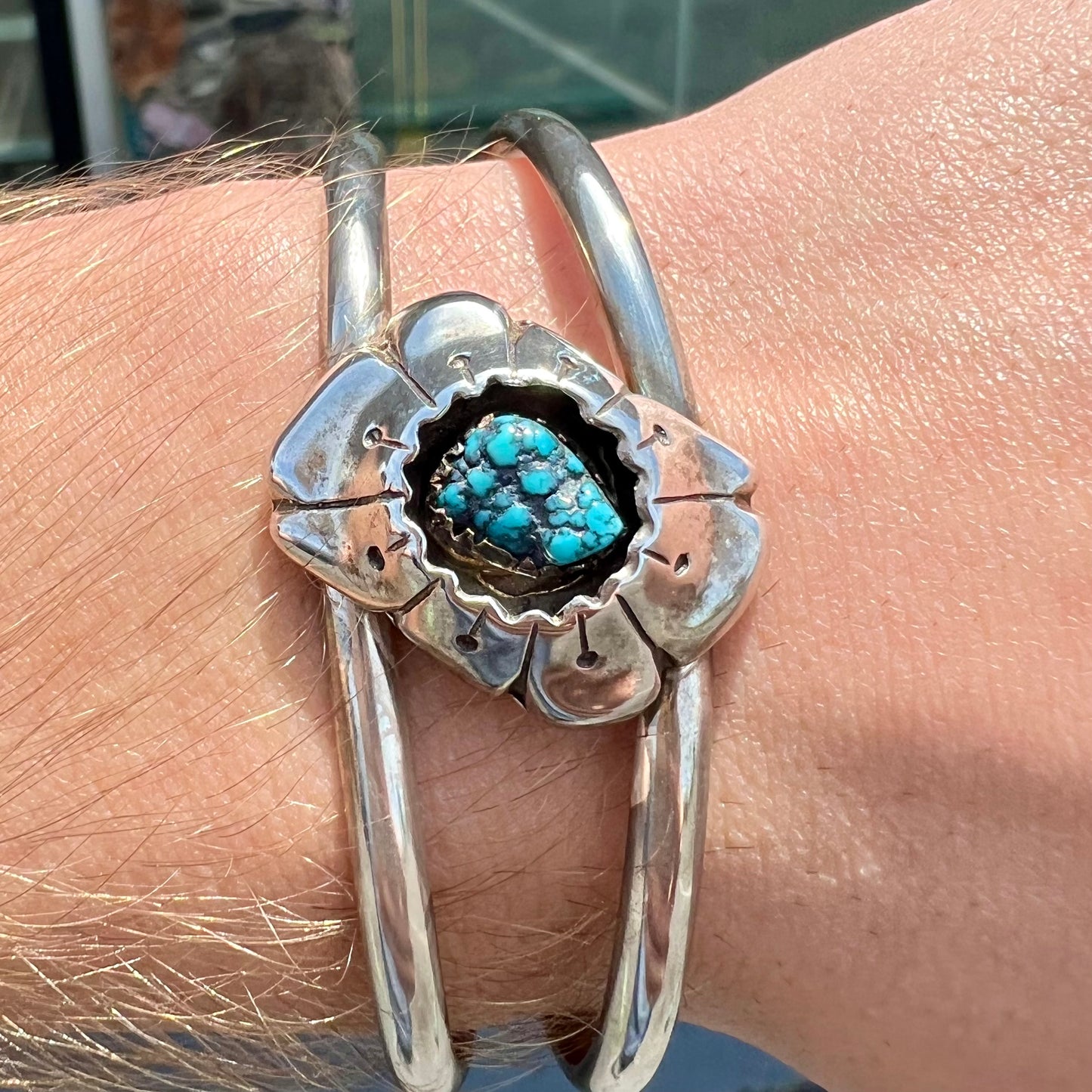 A Navajo style rough turquoise nugget silver cuff bracelet.