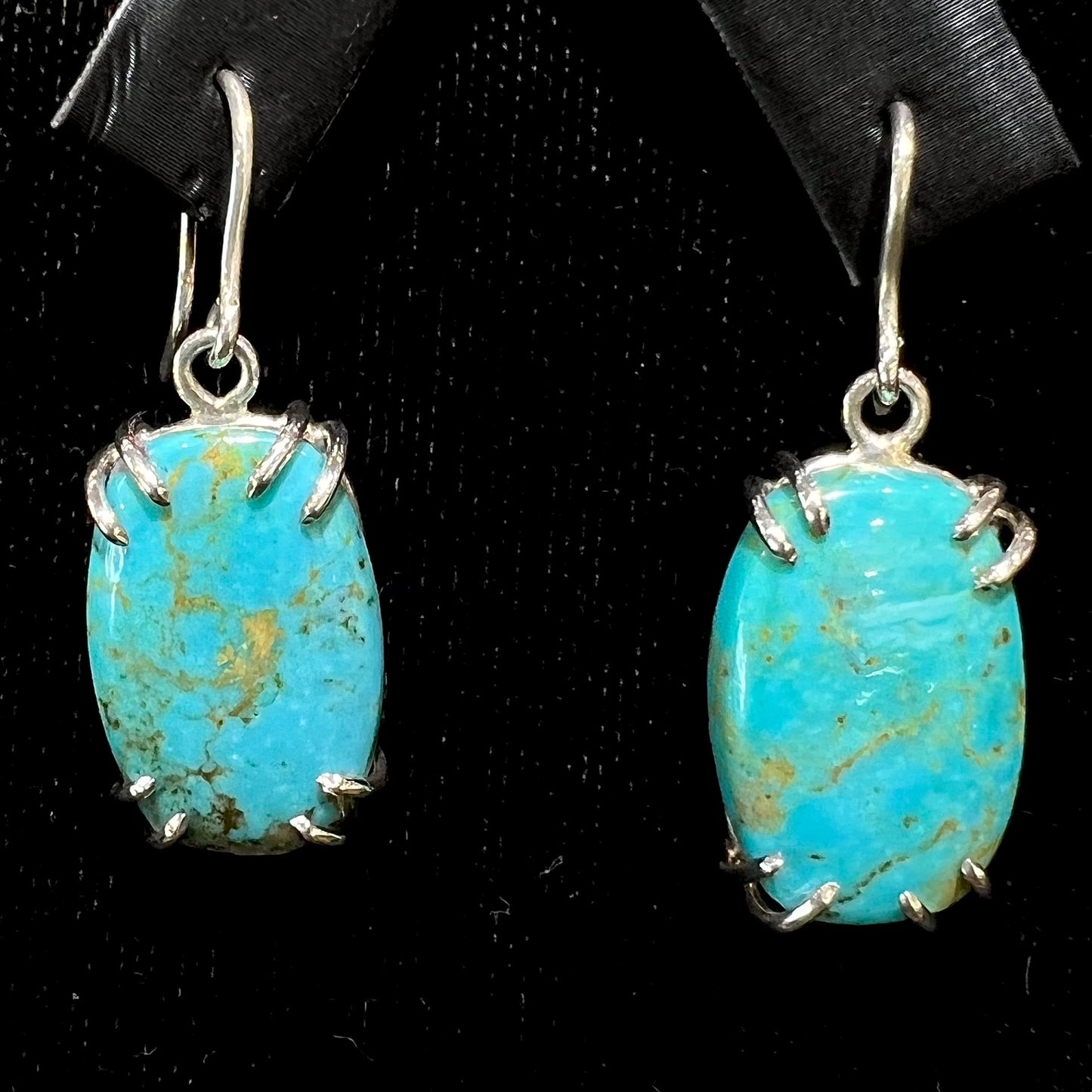 Sterling silver French wire earrings double prong set with cabochon cut Turquoise from Pilot Mountain Mine.