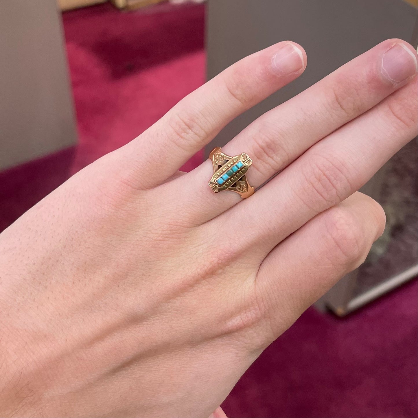 Antique yellow gold ring set with five square turquoise stones, circa 1920's.
