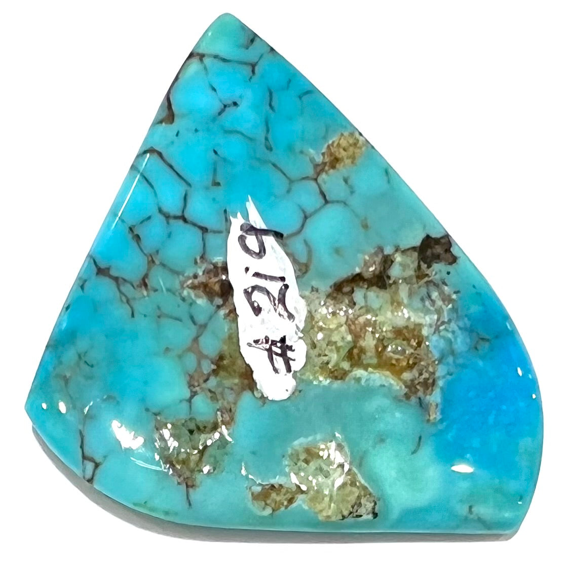 A loose, polished freeform piece of blue turquoise from the Sleeping Beauty Mine in Arizona.