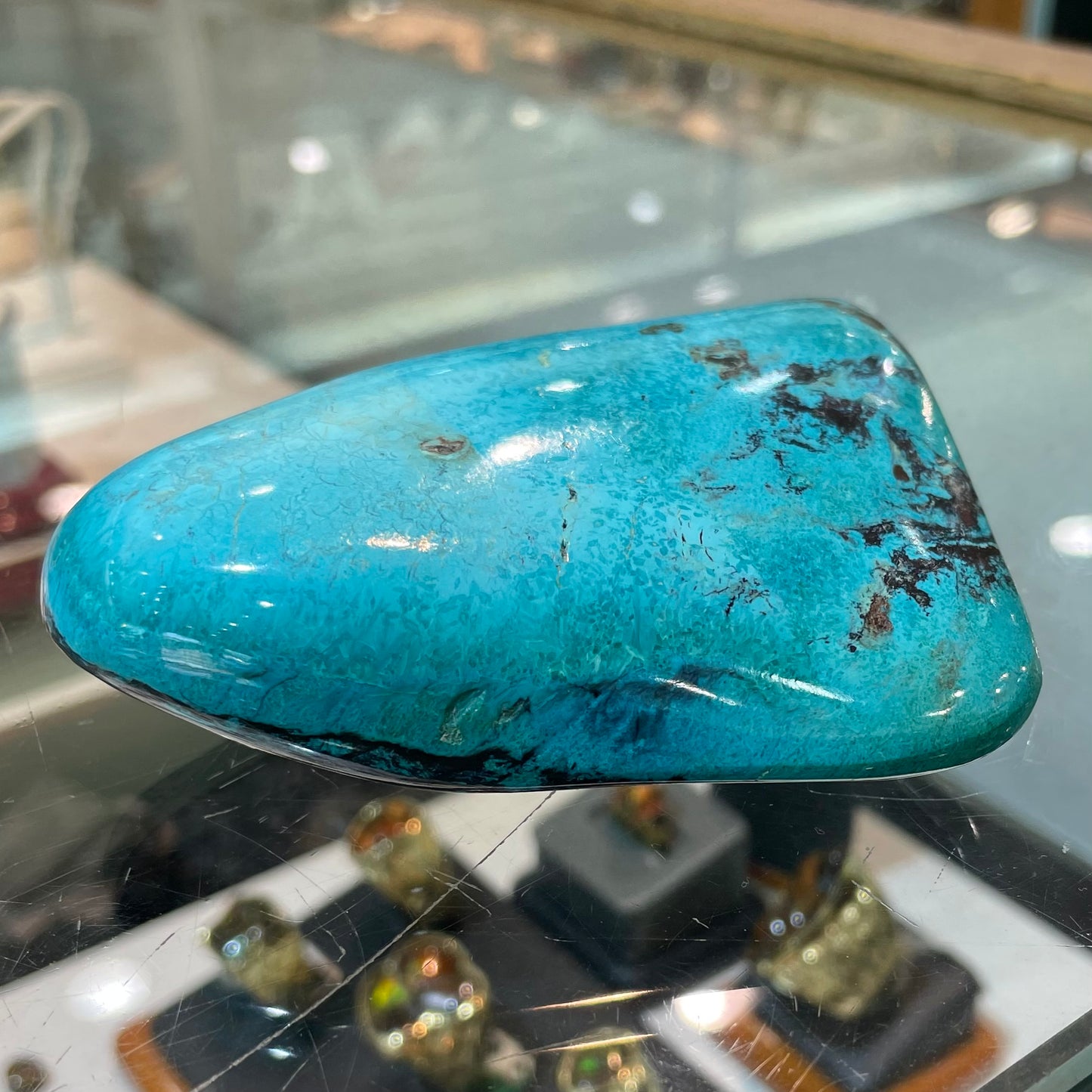 An exceptionally large, freeform shaped, polished turquoise specimen from Morenci, Arizona.