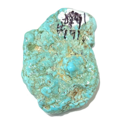 A loose, lightly polished nugget of Sleeping Beauty turquoise.