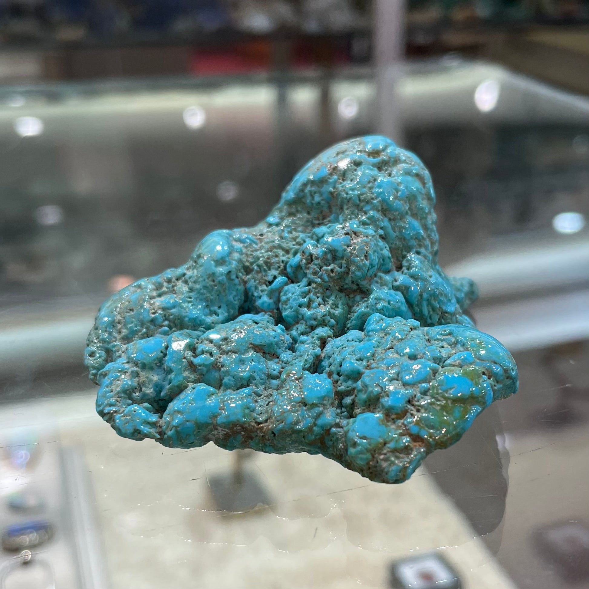 A loose, slightly polished natural turquoise nugget from Sleeping Beauty Mine, Arizona.
