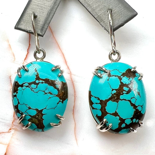 Sterling silver French wire earrings double prong set with cabochon cut turquoise from Valley Blue Mine in Lander County, Nevada.