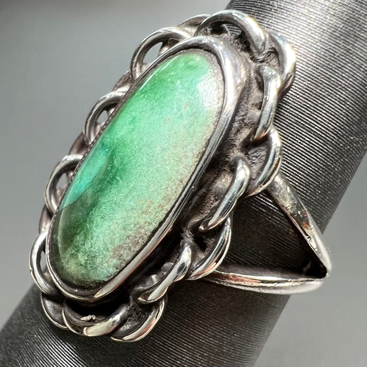 A handmade, split shank, sterling silver ring bezel set with a green variscite stone from Utah, USA.