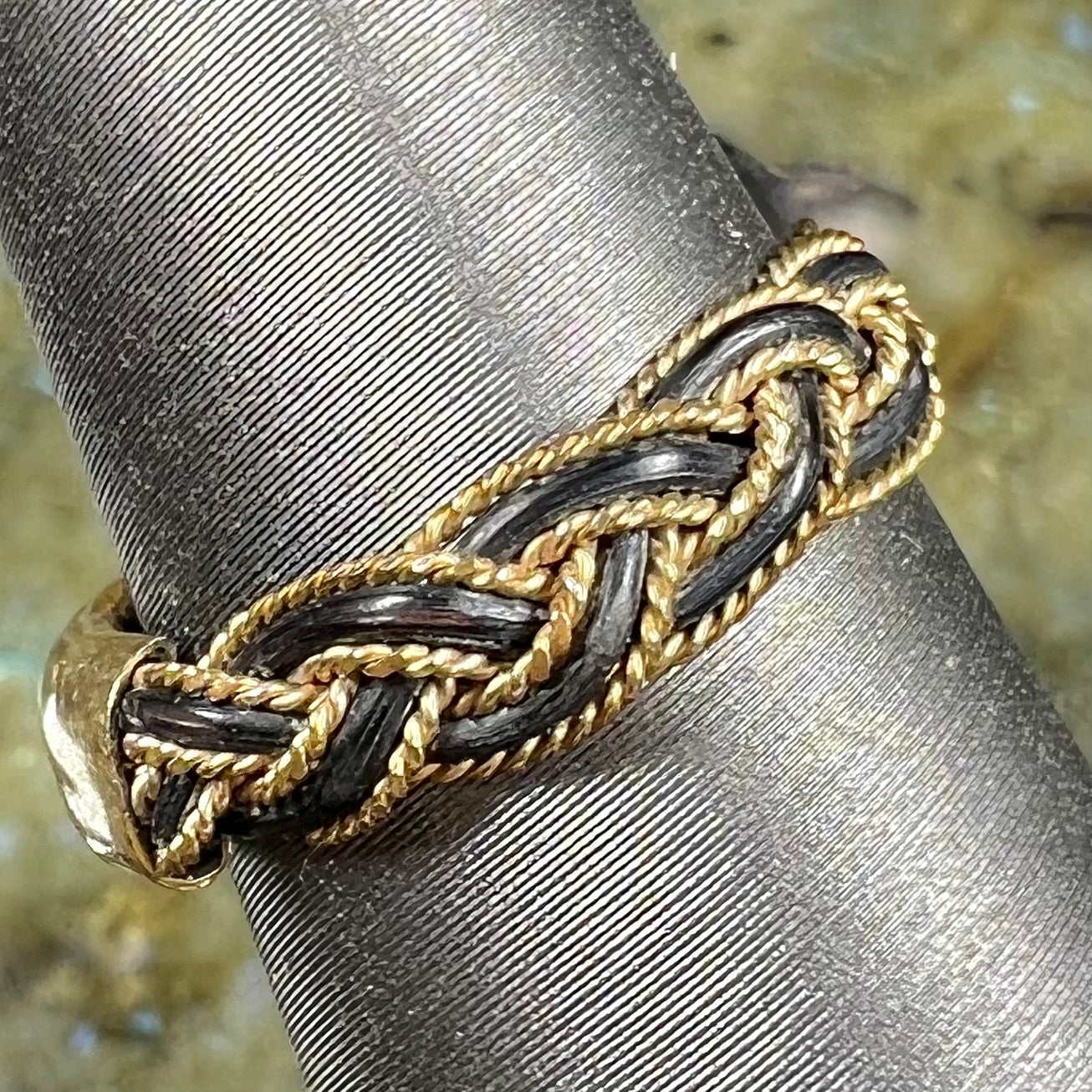 A braided elephant hair gold ring from the Victorian era.
