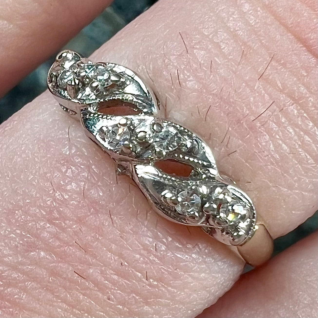 A vintage two tone diamond band set with single cut diamonds.