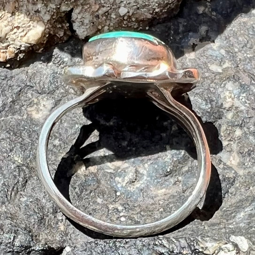 A handmade sterling silver turquoise ring set with a turquoise stone from Pilot Mountain.