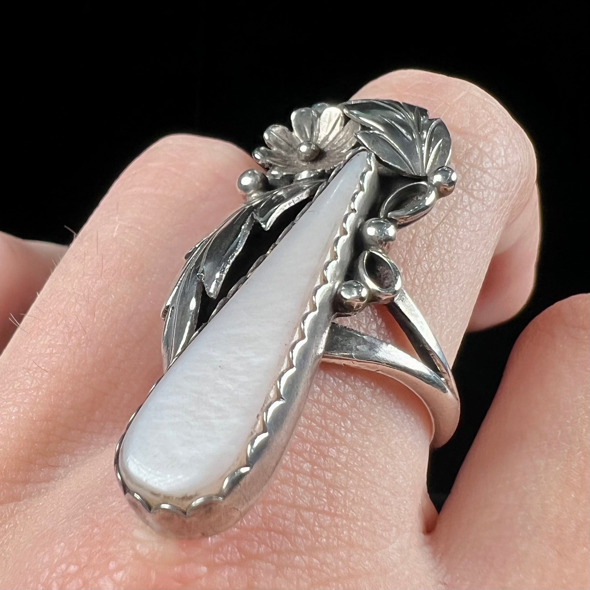 A sterling silver mother of pearl drop ring handmade in Navajo style, signed "MORNINGSTAR."