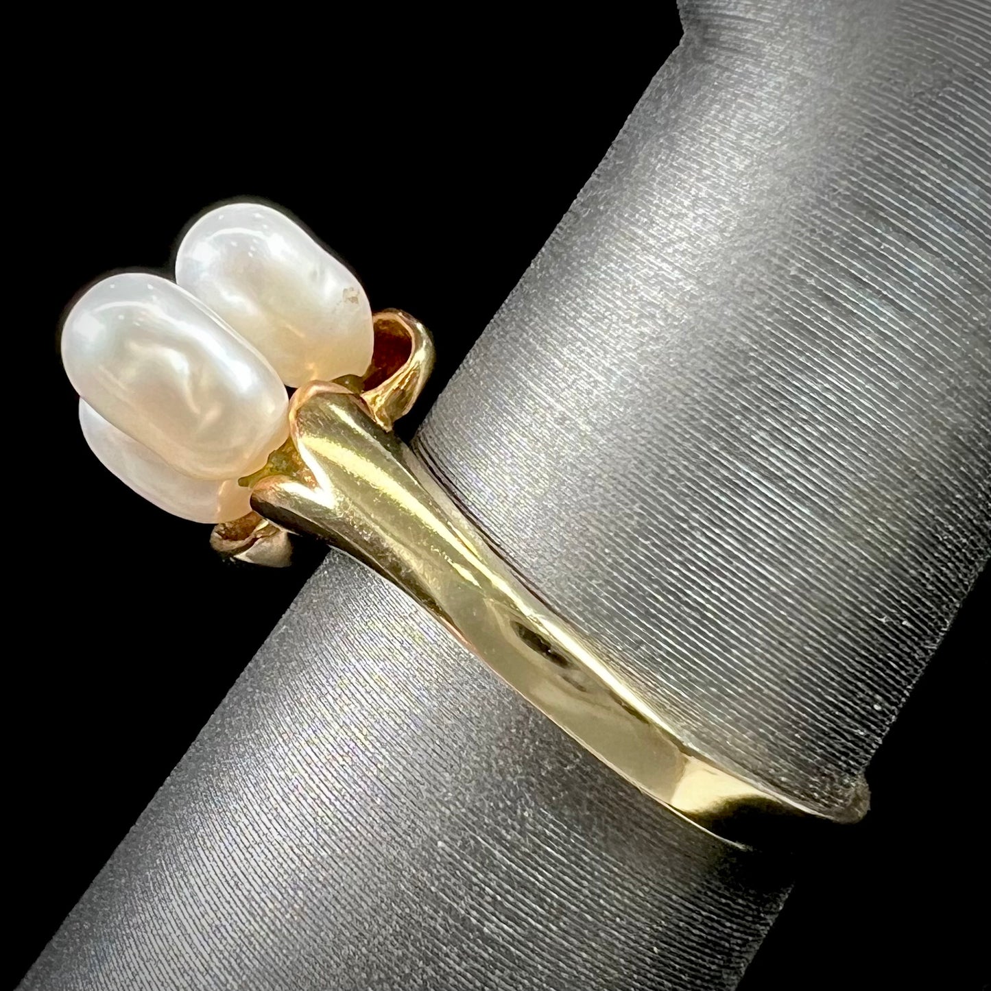 A ladies' vintage, midcentury style freshwater pearl cluster ring in yellow gold.