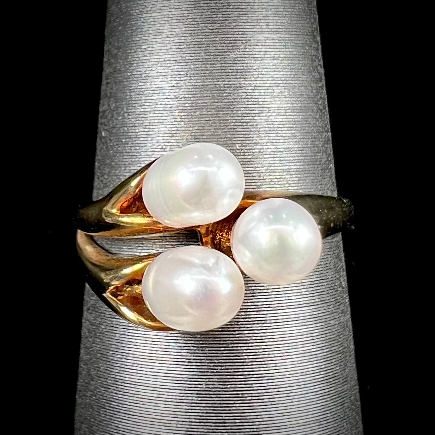 A ladies' vintage, midcentury style freshwater pearl cluster ring in yellow gold.