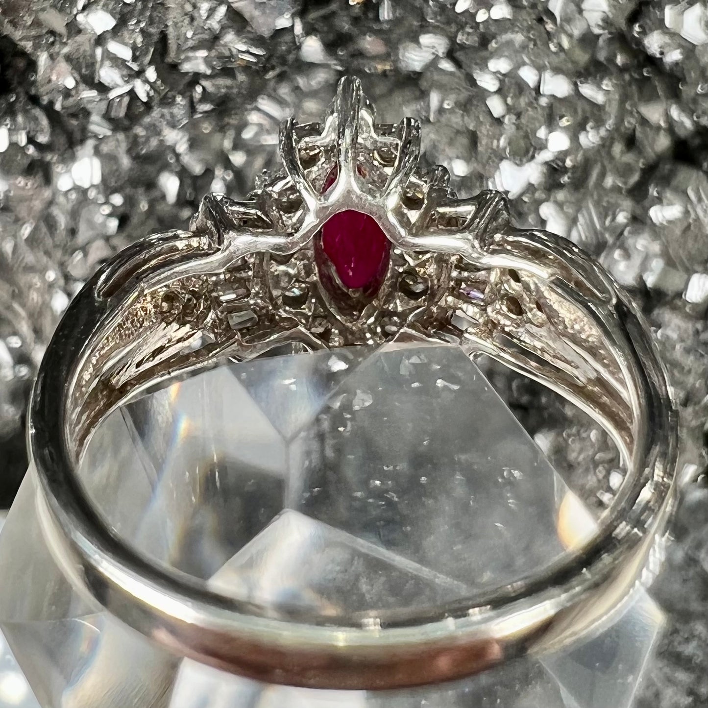 A vintage style white gold marquise cabochon cut ruby and diamond ring.