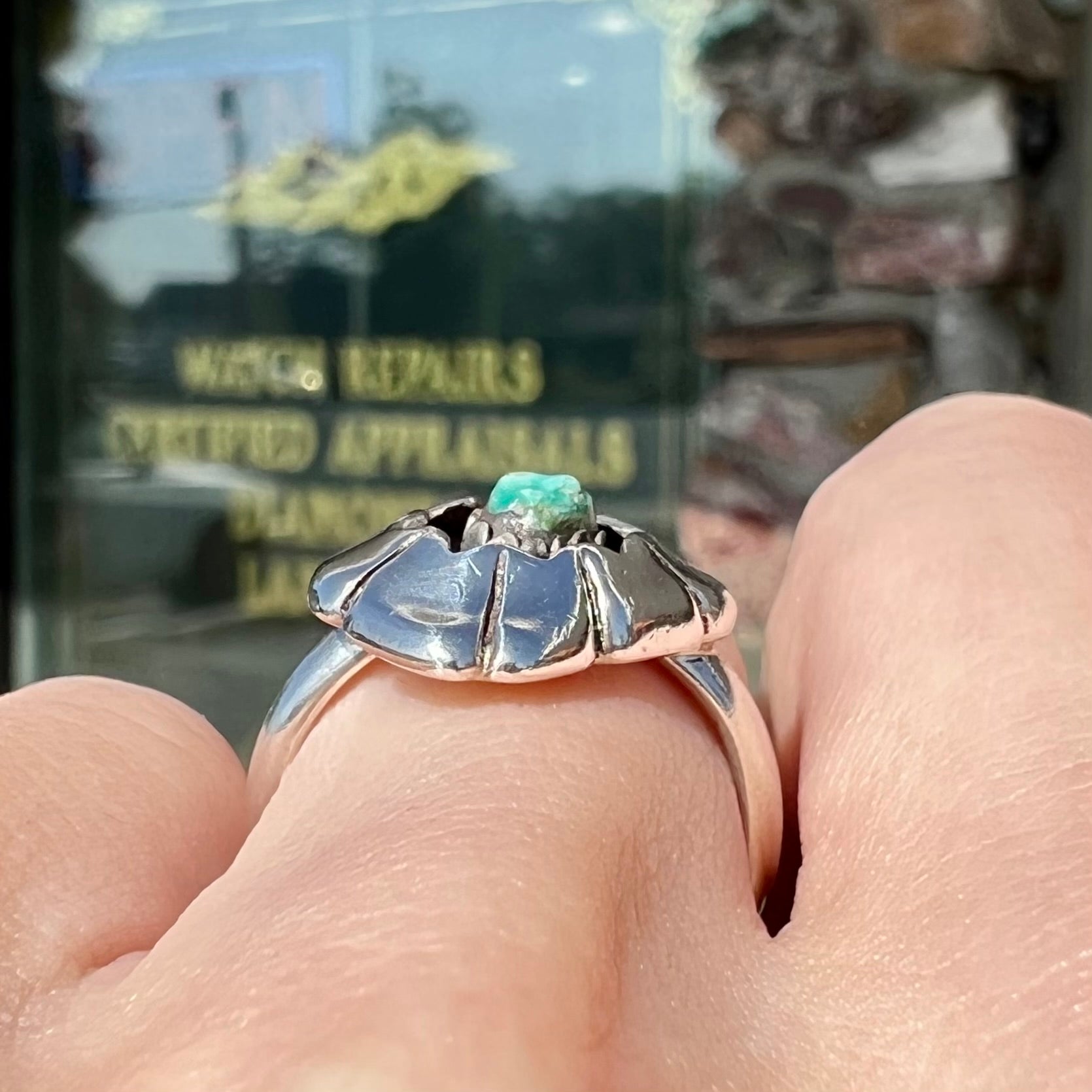 A handmade, sterling silver Native American turquoise nugget ring.