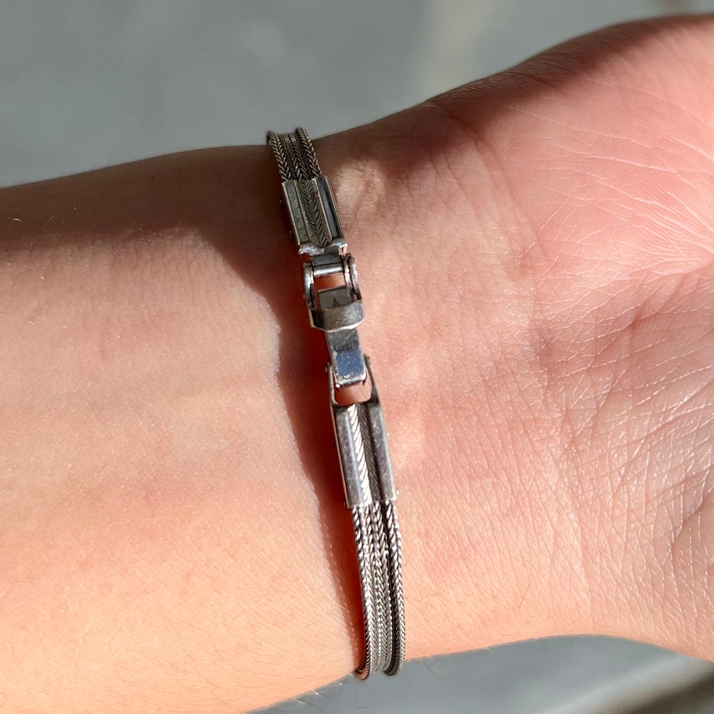 A Virgin Valley fire opal and diamond bracelet made from a vintage 1930's watch.