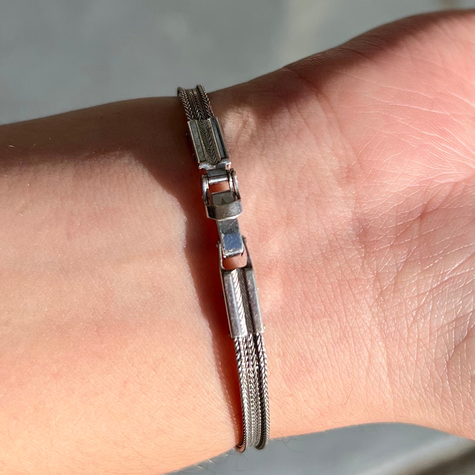 A Virgin Valley fire opal and diamond bracelet made from a vintage 1930's watch.