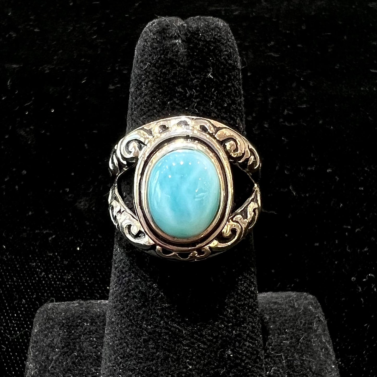 Sterling silver ring with black antiqued highlights set with blue larimar stone.