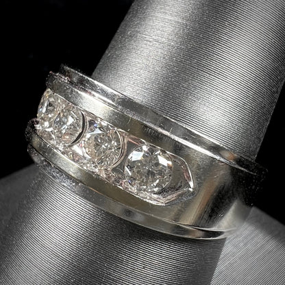 A men's estate white gold five stone diamond ring.