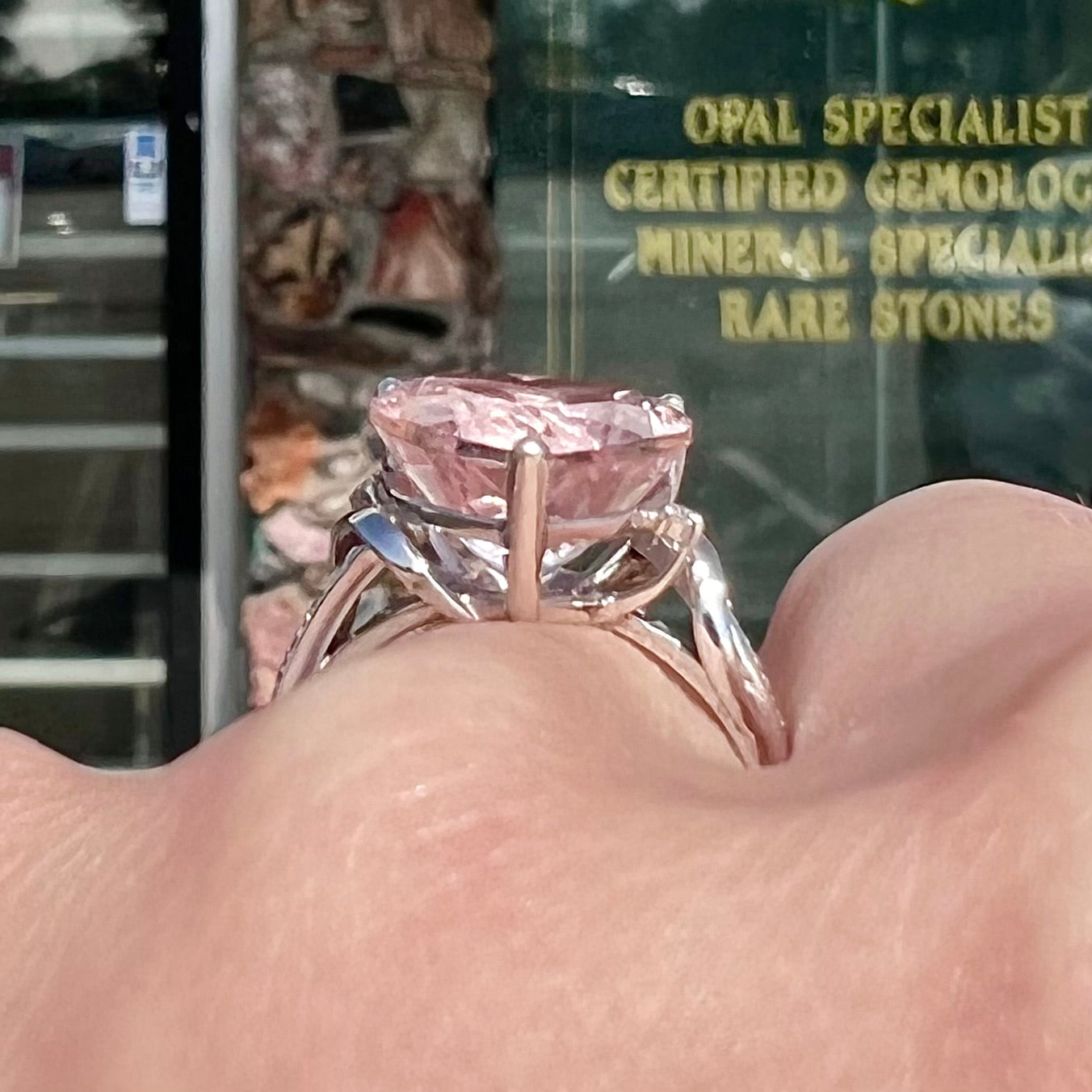A white gold and diamond heart shaped morganite engagement ring.
